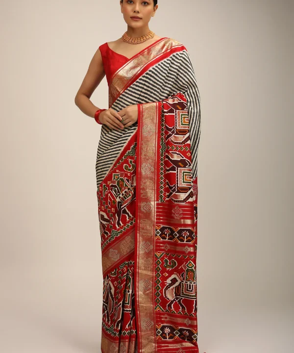 Red Saree In Silk With Multi Colored Patola Print And Diagonal Stripes